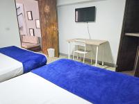 Economy Quadruple Room with Shared Bathroom