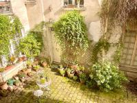 Bel appartement ancien sur cour verdoyante - B&B Parigi