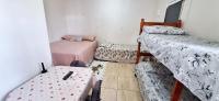 KITNET S1 em TORRES-RS - Na mais bela praia Gaúcha - Cozinha - Banheiro - Ar condicionado - TV e Wi-Fi - Estacionamento - Anfitriã Superhost no BnB - B&B