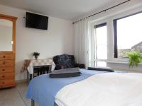 Habitación Triple con balcón