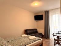 Dreibettzimmer mit Balkon