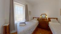 Tweepersoonskamer met 2 Aparte Bedden en Badkamer