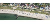 Strandvilla Haffkrug Apartment Kormoran - B&B Haffkrug