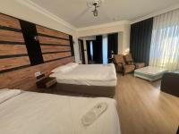Chambre Quadruple Deluxe - Vue sur Mer