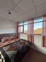 Chambre Double - Vue sur Montagne