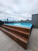 Depto céntrico en Pinamar con parrilla y piscina en la terraza - B&B Pinamar
