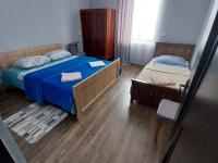Tweepersoonskamer met 2 Aparte Bedden