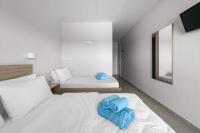 Dreibettzimmer mit Meerblick