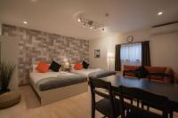 Camera Deluxe Doppia con Letti Singoli