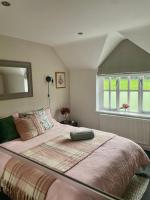 Kamer met Kingsize Bed en Uitzicht op de Tuin