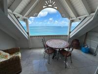 studio grand case - front de mer - B&B