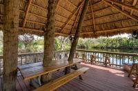 Riverside Luau Tiki Hut Fire Pit & Outdoor Fun - B&B Bradenton