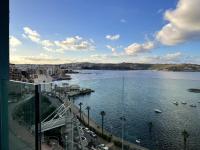 Stunning Sea View Apartment - Chambres d’hôtes San Pawl il-Baħar