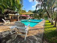 El encanto tropical, a minutos del IRTRA - Bed and Breakfast