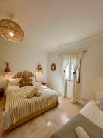 Habitación Triple con vistas al jardín