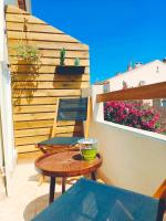 Appartement au pied de la plage - Ferienwohnung