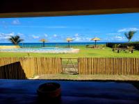 Casa de condomínio de frente a praia - Chambres d’hôtes