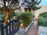 Casa con giardino, Wi-Fi e aria condizionata vicino alla Pelosa - Chambres d'hôtes Stintino