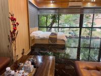 Four-Bedroom Apartment with Balcony 