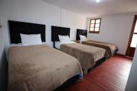 Chambre Triple avec Salle de Bains Commune