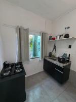 Casa Kitnet Caiçara - Rua do Sesc Bertioga dentro de Pousada Lemon - B&B Bertioga