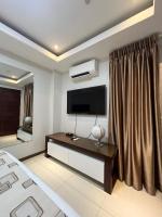 Sheryll Escapes - La Grande 406 cozy 1 bedroom Wi-Fi and Netflix - Chambres d'hôtes Angeles City