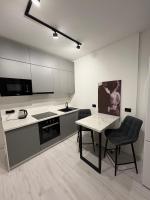 Однокомнатная квартира в элитном ЖК Alapark - Chambres d'hôtes Almaty