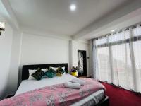 Chambre Triple – Vue sur Montagne