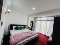 Chambre Triple – Vue sur Montagne