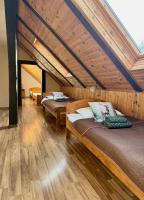 Camera Quadrupla con Vista Giardino 