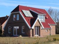Ferienhaus Sonneninsel in Dornum - Ferienwohnung