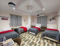 Camera Quadrupla con Bagno in Comune