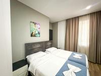 Tweepersoonskamer met 2 Aparte Bedden