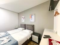Tweepersoonskamer met 2 Aparte Bedden en Balkon