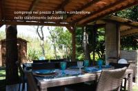 la casetta bamboo " 50 mt dal mare" incluso ombrellone e 2 lettini nello stabilimento - B&B