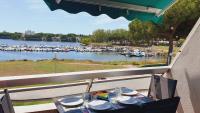 Au Bord du Lac & Golf avec Parking privé Clim Wifi - 4 personnes - ROSSIconciergerie - Linge inclus - Chambres d'hôtes La Grande-Motte