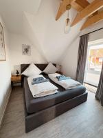 Ferienwohnung KÖÖK Küstentraum - Modern, Balkon, Strandnah, Maisonette - Ferienwohnung Neuharlingersiel