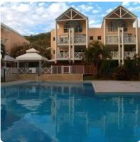 Spacieux appartement avec terrasse et piscine au Diamant - B&B Le Diamant