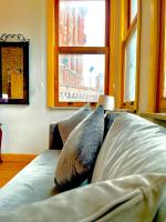 One-Bedroom Apartment with Balcony and City View