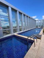 M&V Flats - Prédio Vision - 1,5 km Mané Garrincha - 500m Esplanada dos Ministérios - Vaga de garagem - Ar condicionado - Cama queen size - Piscina - Academia - Chambres d'hôtes Brasilia