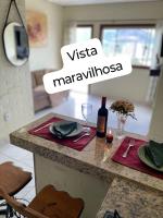 Flat com vista espetacular área central-cozinha completa-AR- 2 banheiros- casais - grupos ou familias ou empresas - B&B Governador Valadares