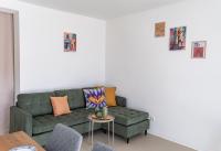 Four-Bedroom Apartment with Balcony 