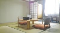 Dreibettzimmer mit Bergblick