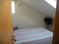 Basic Single Room with Shared Bathroom