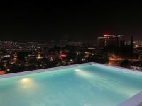 Affordable Luxury Rooms with Pool, Gym and Office Space - B&B Kigali