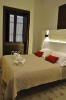 Camera Quadrupla Superior