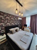 Kamer met Queensize Bed en Balkon