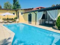 Suite - Vue sur Piscine