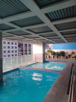 Ortigas Condotel near Robinsons Galleria with free pool - B&B