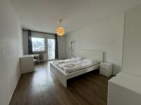 Three-Bedroom Apartment with Balcony